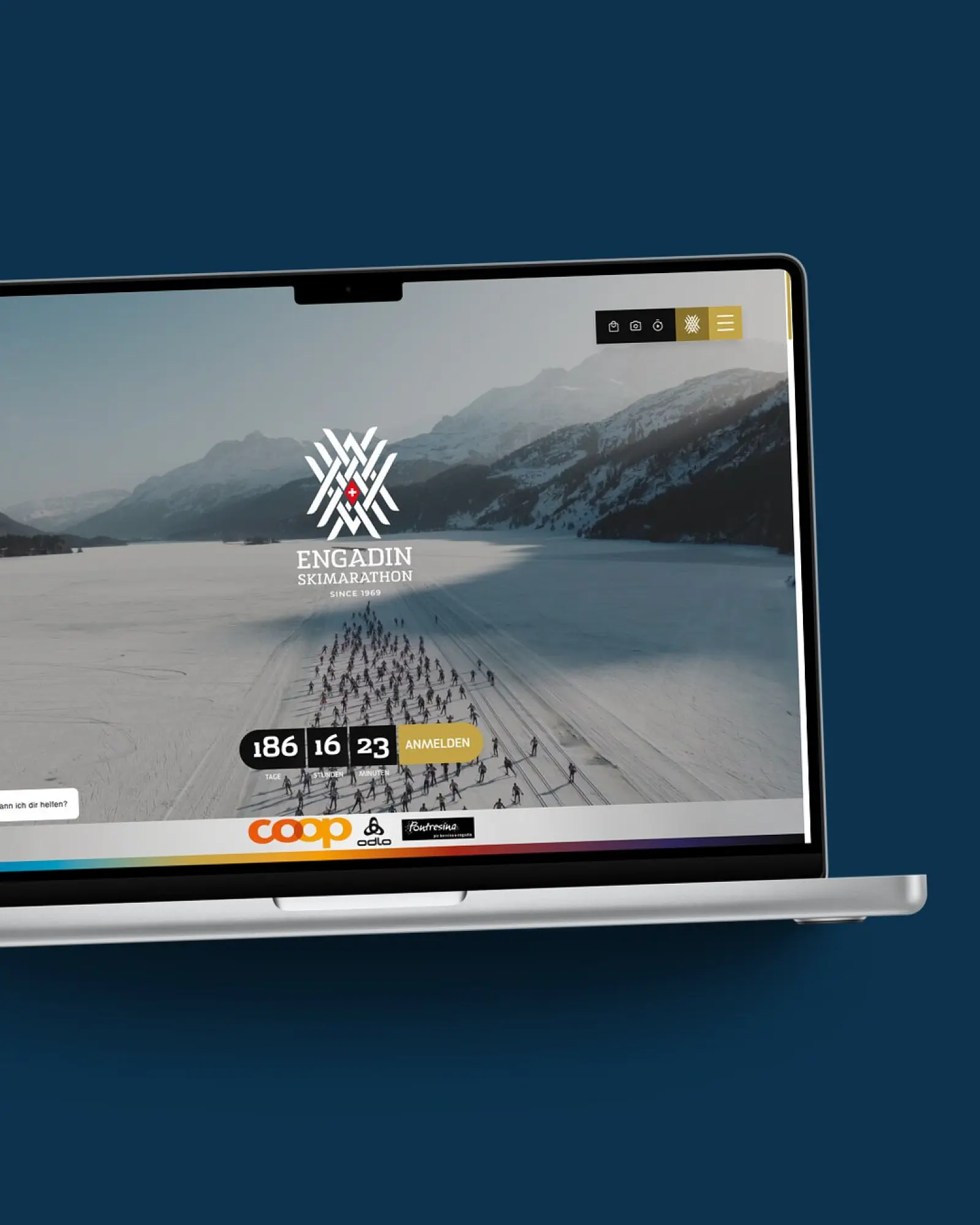 Startseite von ESM auf einem MacBook, vor einer Fläche in der Kundenfarbe