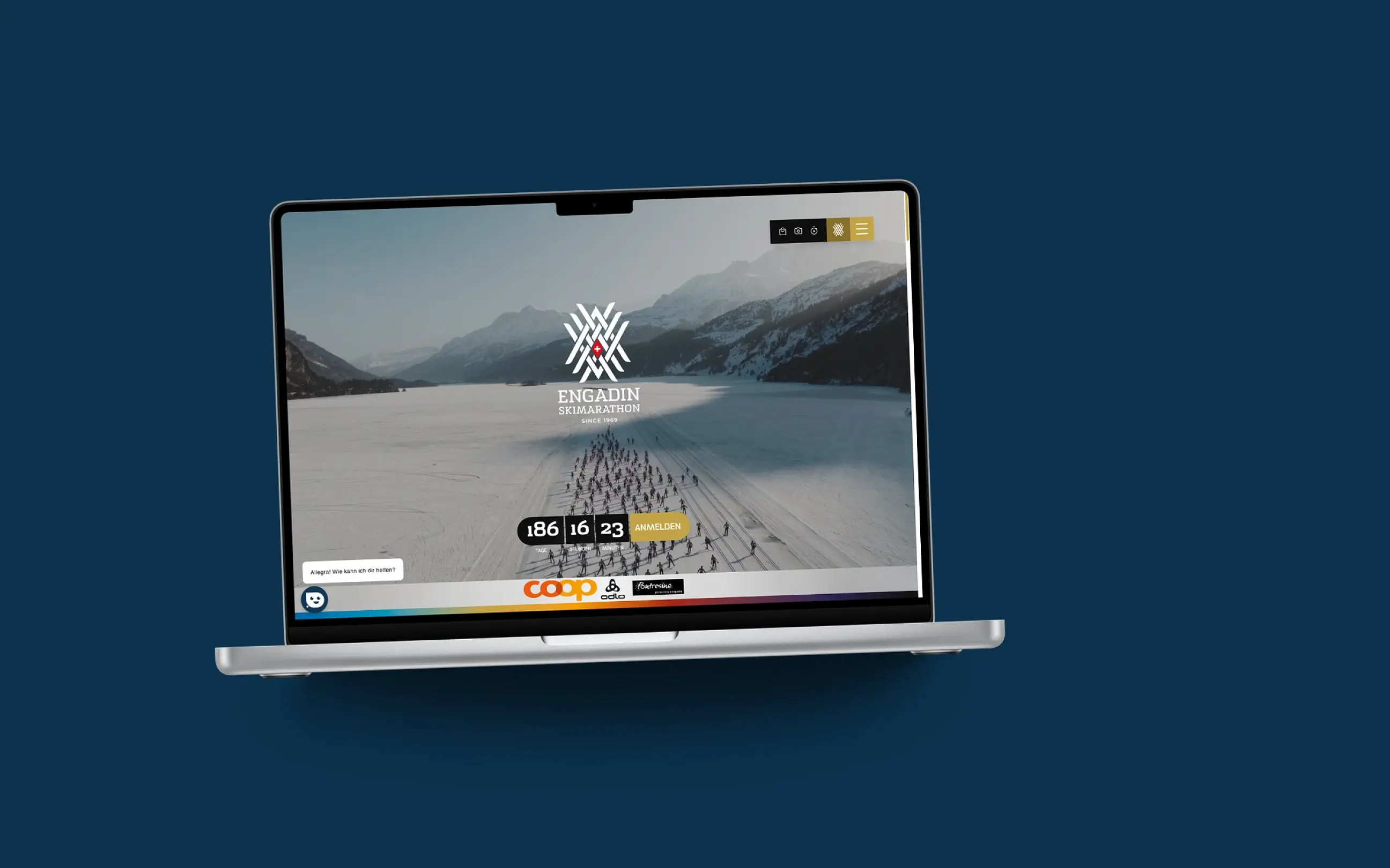 Startseite von ESM auf einem MacBook, vor einer Fläche in der Kundenfarbe