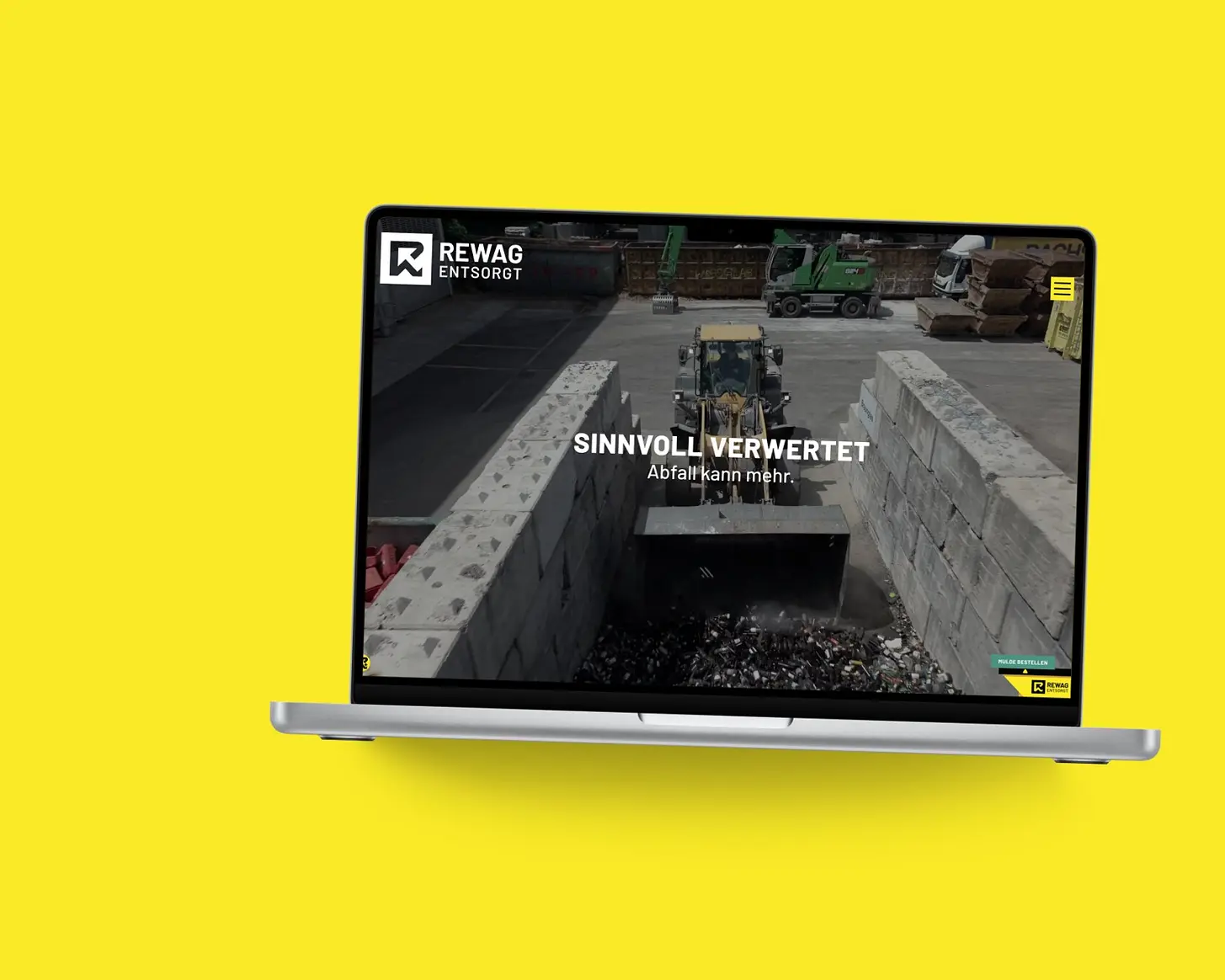 Startseite von REWAG AG auf einem MacBook, vor einer Fläche in der Kundenfarbe