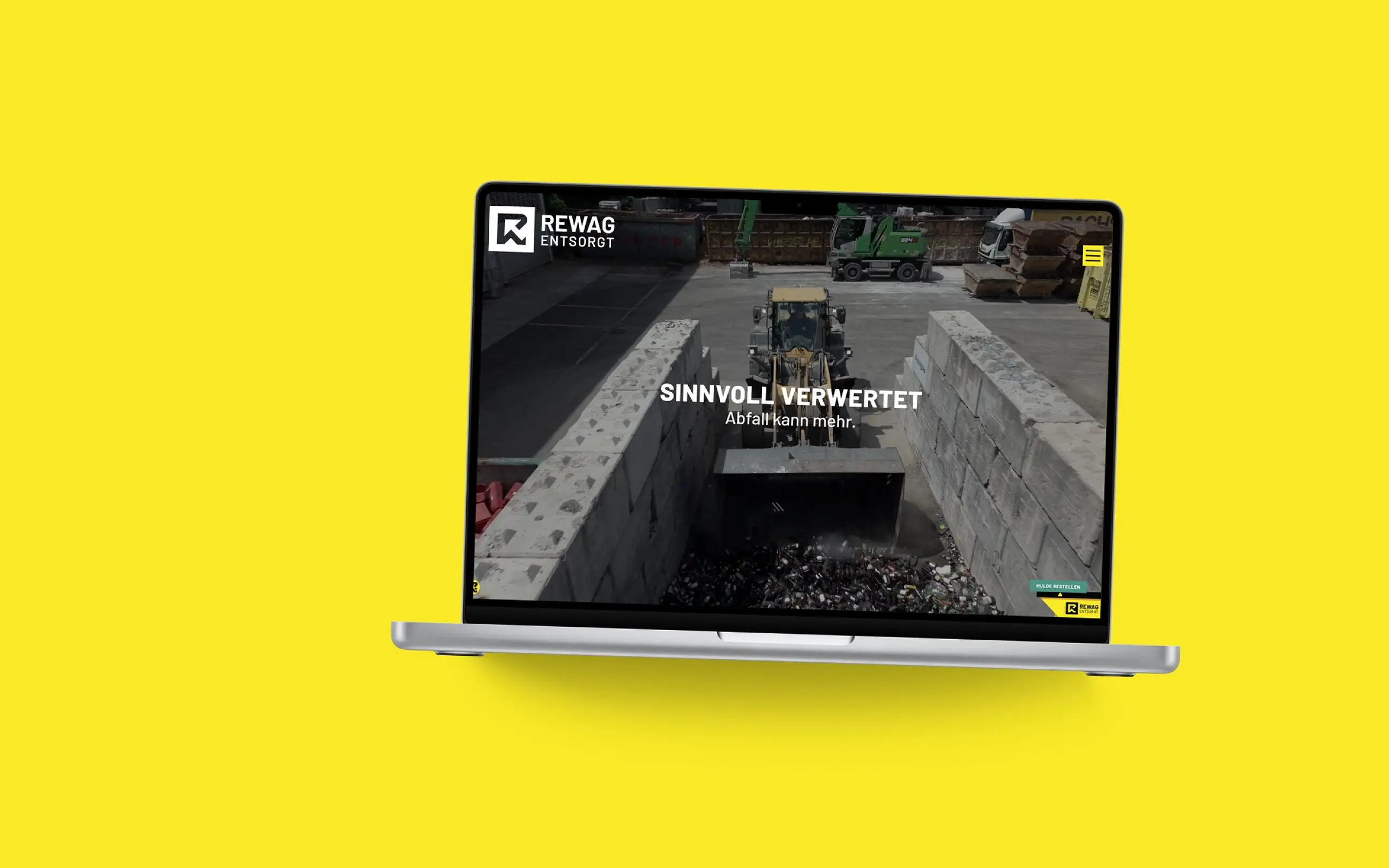 Startseite von REWAG AG auf einem MacBook, vor einer Fläche in der Kundenfarbe